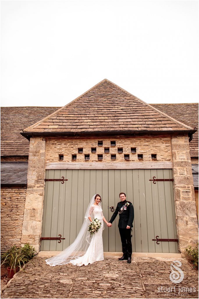 Creative beautiful portraits of the couple in the gardens at Oxleaze Barn in Gloucestershire by Documentary Wedding Photographer Stuart James