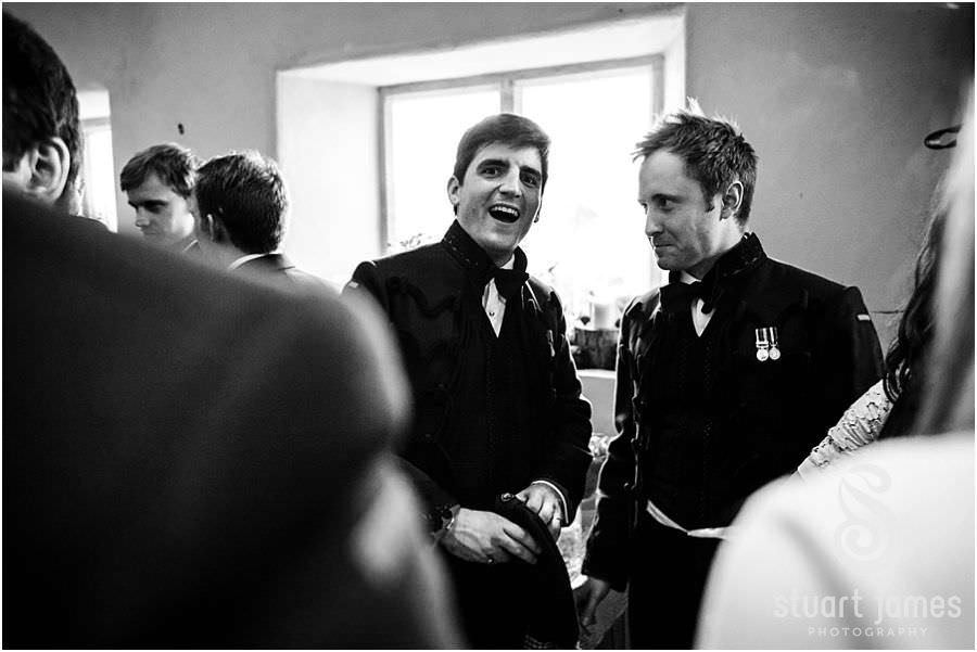 Creative candid photos of the wedding breakfast at Oxleaze Barn in Gloucestershire by Documentary Wedding Photographer Stuart James