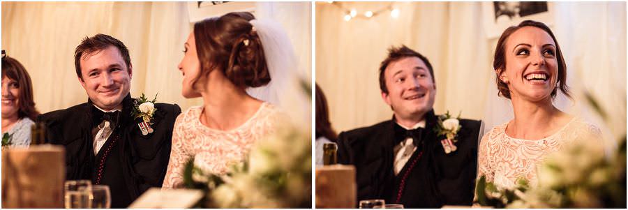 Fabulous reactions to the entertaining Father of the Bride speech at Oxleaze Barn in Gloucestershire by Documentary Wedding Photographer Stuart James