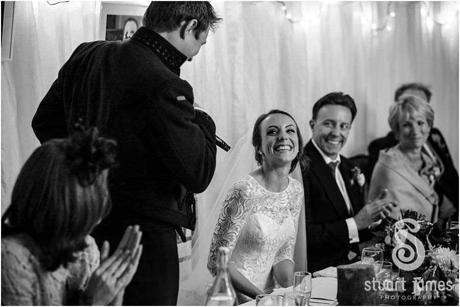 Documenting the emotion of the Grooms speech at Oxleaze Barn in Gloucestershire by Documentary Wedding Photographer Stuart James