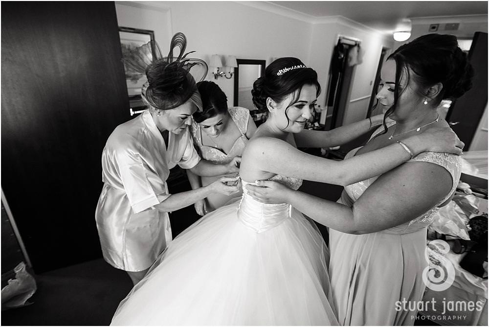 Documenting the bridal preparations at Moor Hall in Sutton Coldfield by Documentary Wedding Photographer Stuart James