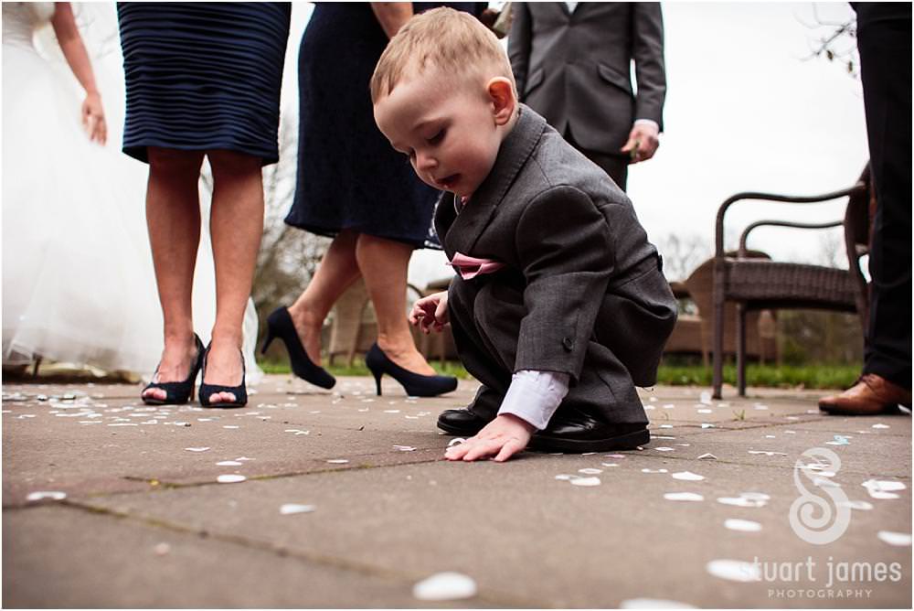 Confetti fun at Moor Hall in Sutton Coldfield by Documentary Wedding Photographer Stuart James