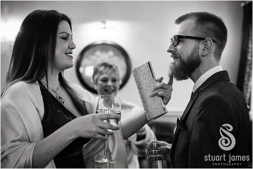 Capturing the arrival of the wedding guests at Weston Hall in Stafford by Documentary Wedding Photographer Stuart James