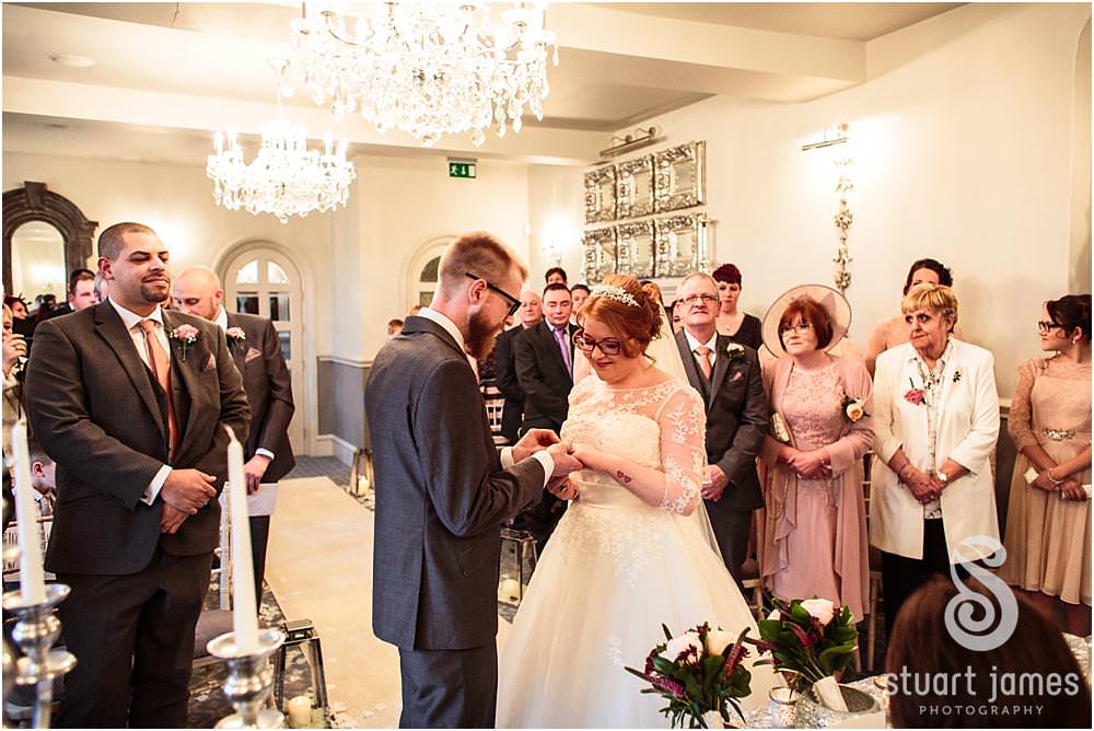 Beautiful photographs of the wedding ceremony at Weston Hall in Stafford by Documentary Wedding Photographer Stuart James