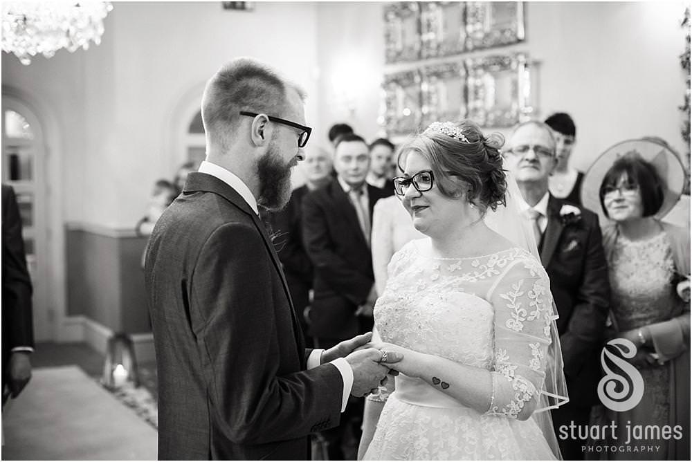 Beautiful photographs of the wedding ceremony at Weston Hall in Stafford by Documentary Wedding Photographer Stuart James