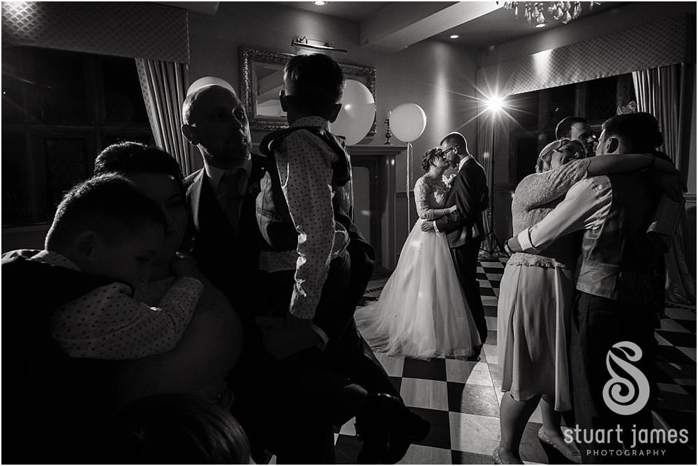 Creative photos of the fabulous dancing and partying at Weston Hall in Stafford by Documentary Wedding Photographer Stuart James