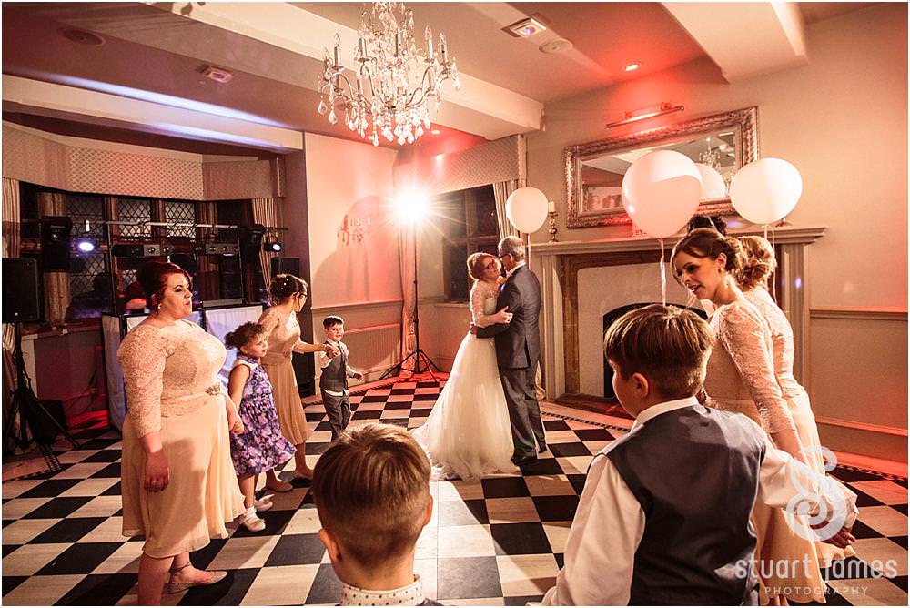 Creative photos of the fabulous dancing and partying at Weston Hall in Stafford by Documentary Wedding Photographer Stuart James