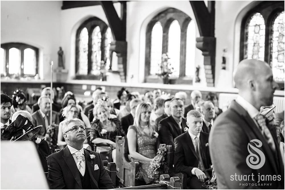 Like father like son, as 'Erik' takes a deep breath as the emotions build during the ceremony