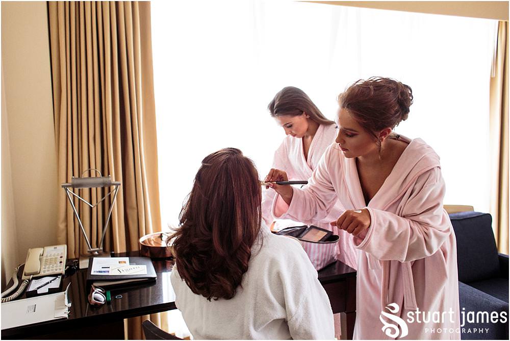 Makeup for the bride by the daughters of the bride, captured by Chelsea Registry Office Wedding Photographer Stuart James