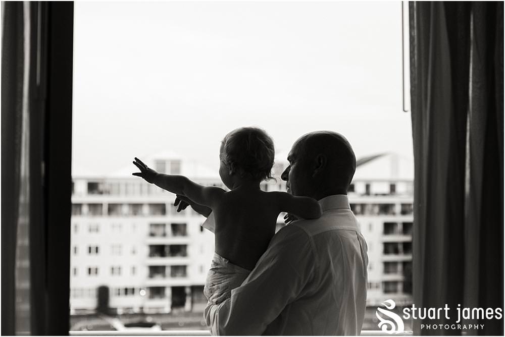 Love this moment holding the little grandson ahead of the wedding by Chelsea Registry Office Wedding Photographer Stuart James