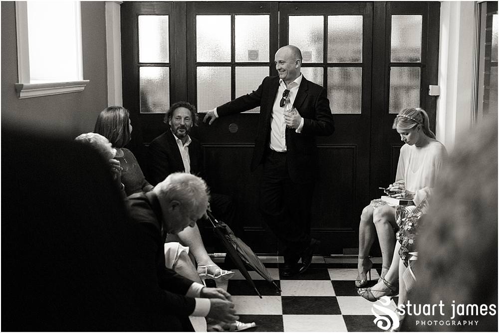 Capturing the guests relaxing ahead of the wedding ceremony at Chelsea Registry Office with Chelsea Registry Office Wedding Photographer Stuart James