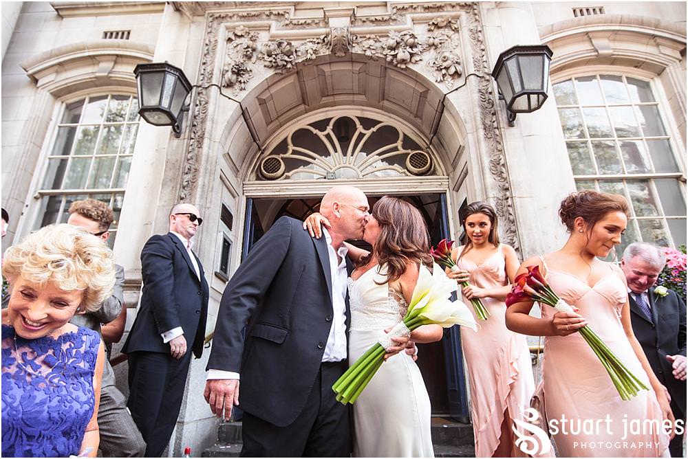 Confetti exit for the newly married couple exiting Chelsea Registry Office with Chelsea Registry Office Wedding Photographer Stuart James