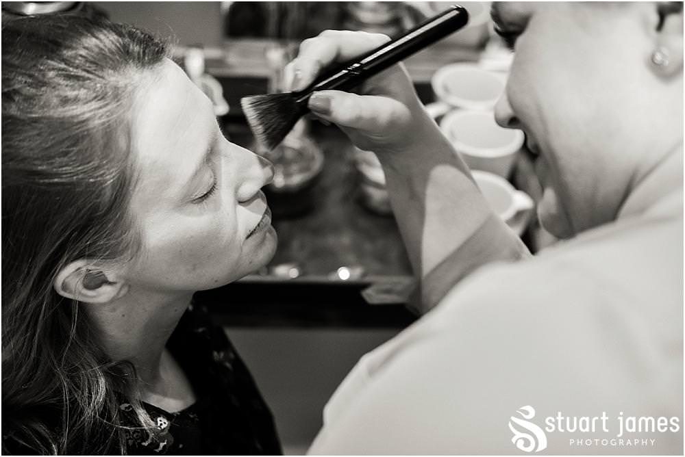 Documentary coverage of the wedding morning with the bridal makeup and finishing touches in Love Is Enough at Pendrell Hall in Codsall, Wolverhampton by Pendrell Hall Wedding Photographers Stuart James