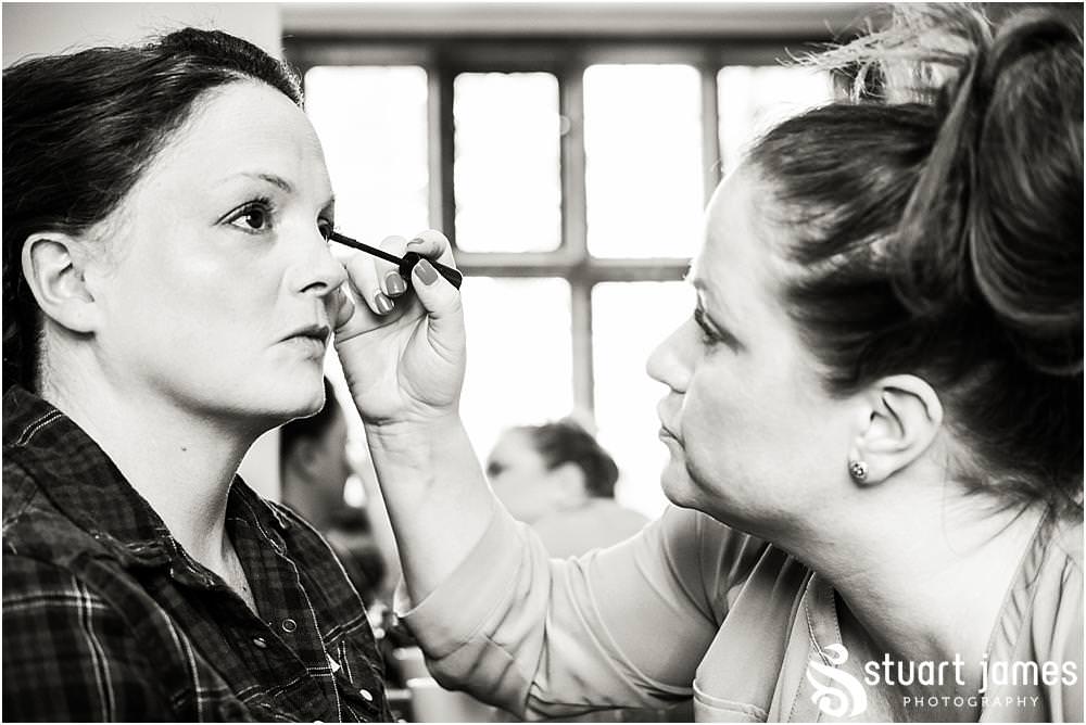 Documentary coverage of the wedding morning with the bridal makeup and finishing touches in Love Is Enough at Pendrell Hall in Codsall, Wolverhampton by Pendrell Hall Wedding Photographers Stuart James