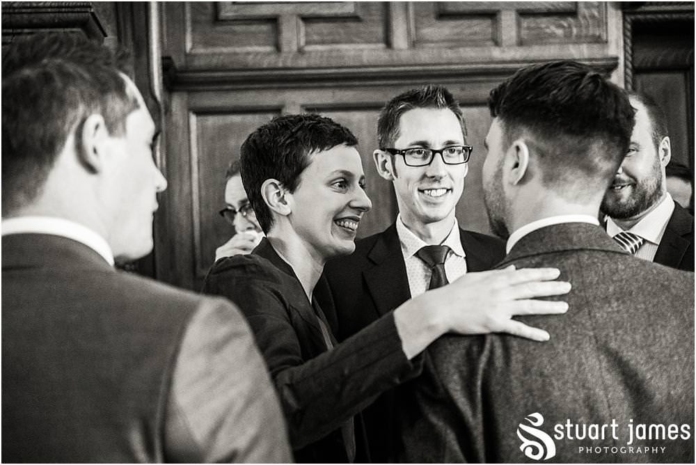 Candid photographs of the guests as they arrive for the wedding at Pendrell Hall in Codsall, Wolverhampton by Pendrell Hall Wedding Photographers Stuart James
