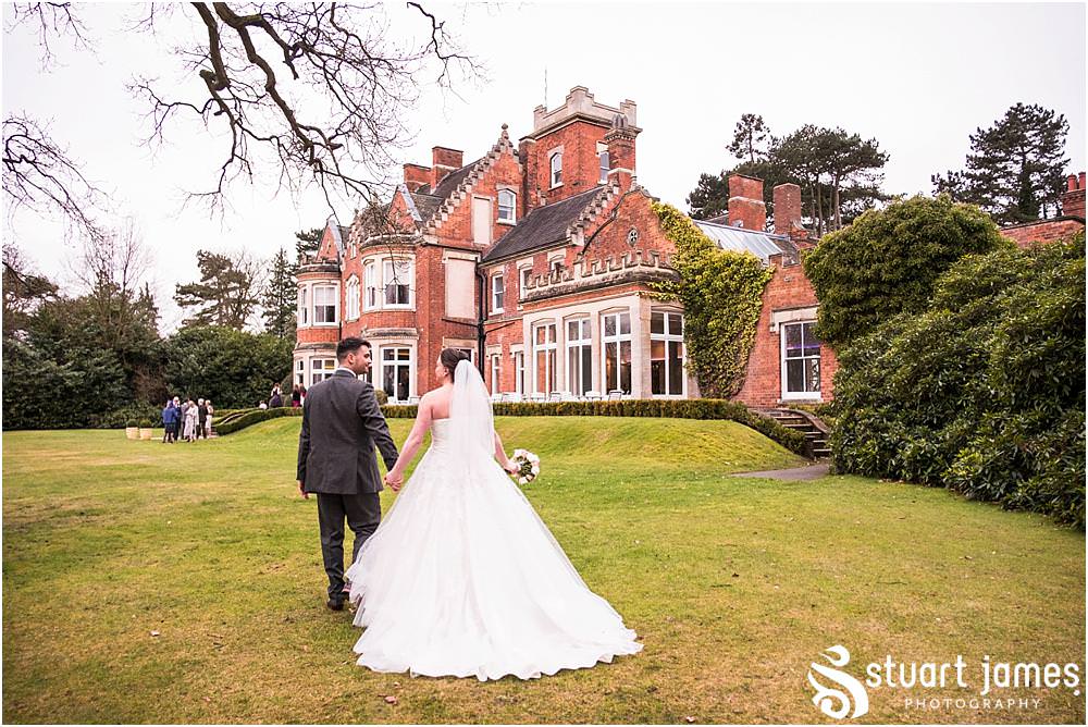 Creative natural portraits of the beautiful bride and groom around the perfect setting of Pendrell Hall in Codsall, Wolverhampton by Pendrell Hall Wedding Photographer Stuart James