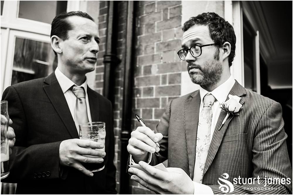 Candid photos that capture the fun the guests have during the drinks reception at Pendrell Hall in Codsall, Wolverhampton by Pendrell Hall Wedding Photographer Stuart James