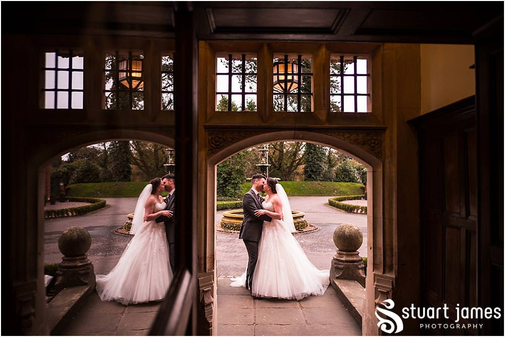 Elegant relaxed portraits in the front courtyard at Pendrell Hall in Codsall, Wolverhampton by Pendrell Hall Wedding Photographer Stuart James