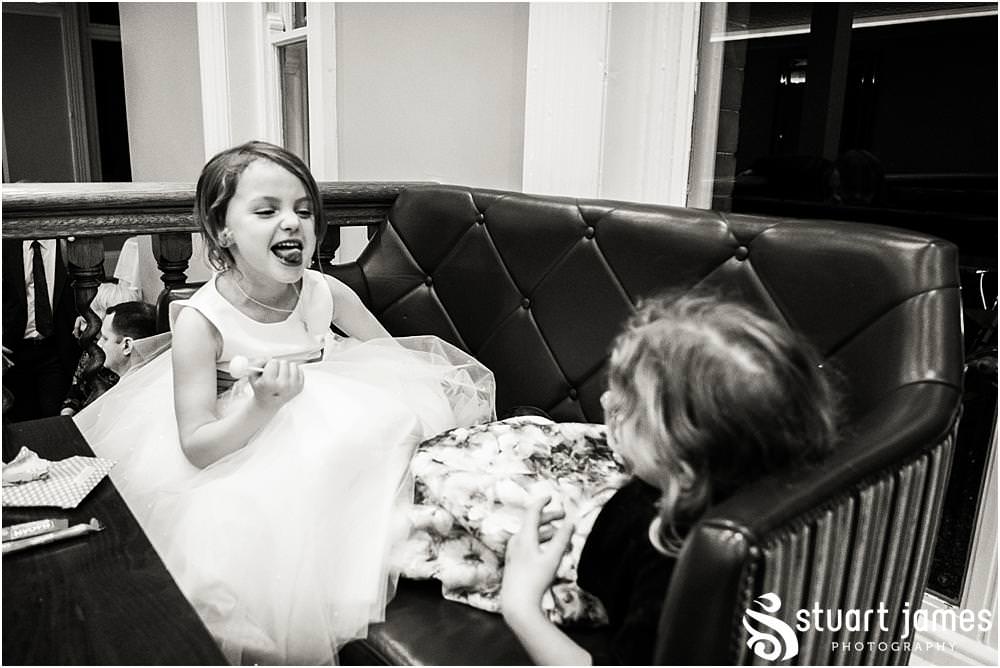 Unobtrusive reportage photographs of the wedding reception as the guests arrive at Pendrell Hall in Codsall, Wolverhampton by Pendrell Hall Wedding Photographer Stuart James
