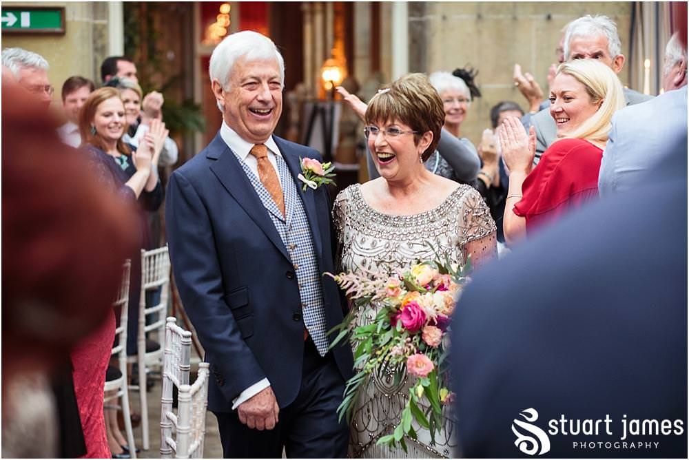 Love the reaction on the Bride and Groom's faces as they enter to their waiting guests at Weston Park for the wedding breakfast