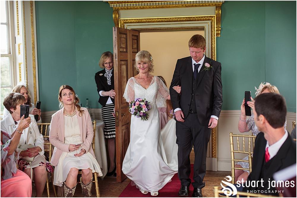 Unobtrusive wedding photography that captures the story of the beautiful wedding ceremony at Tower of the Winds, Shugborough in Staffordshire