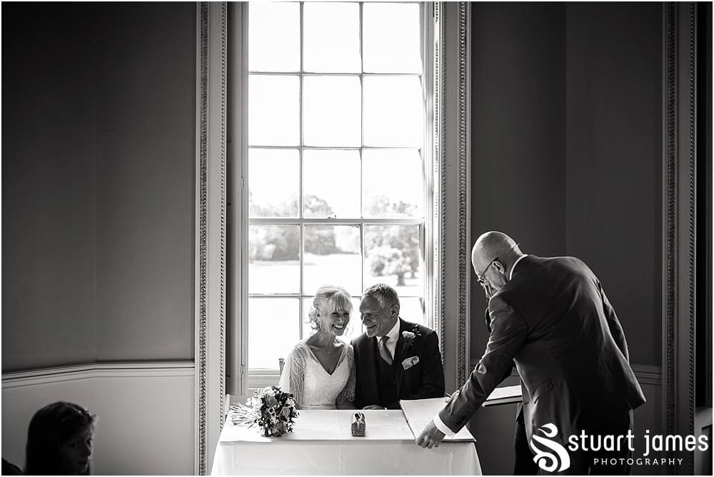 Unobtrusive wedding photography that captures the story of the beautiful wedding ceremony at Tower of the Winds, Shugborough in Staffordshire