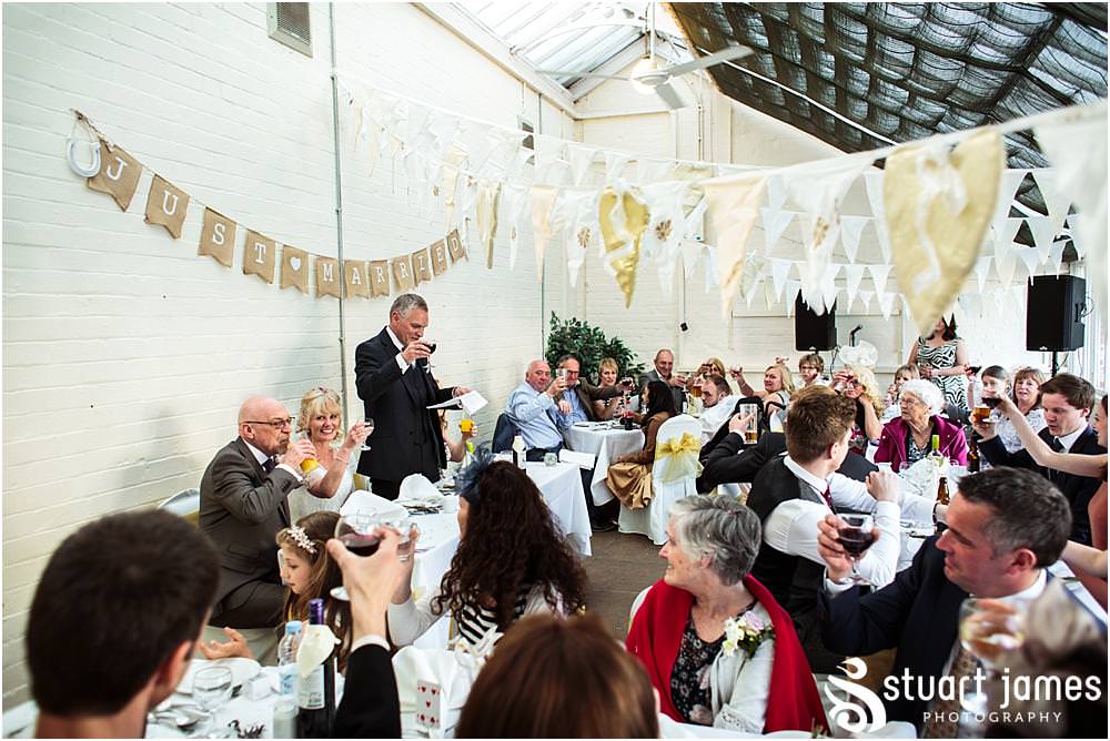 Documentary wedding photography that captures the reactions, the stories and the people during the emotional wedding speeches in the Garden Room at Shugborough