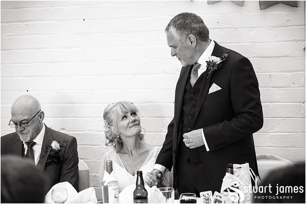 Documentary wedding photography that captures the reactions, the stories and the people during the emotional wedding speeches in the Garden Room at Shugborough