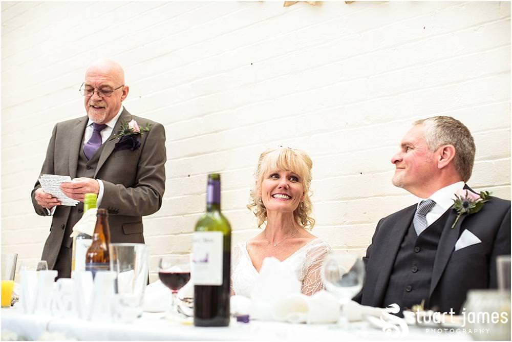 Documentary wedding photography that captures the reactions, the stories and the people during the emotional wedding speeches in the Garden Room at Shugborough