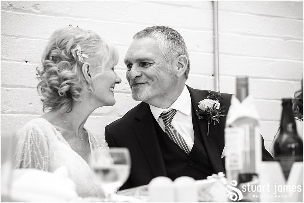 Documentary wedding photography that captures the reactions, the stories and the people during the emotional wedding speeches in the Garden Room at Shugborough