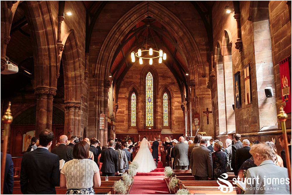 Unobtrusive documentary wedding photographs telling the story of the wedding ceremony