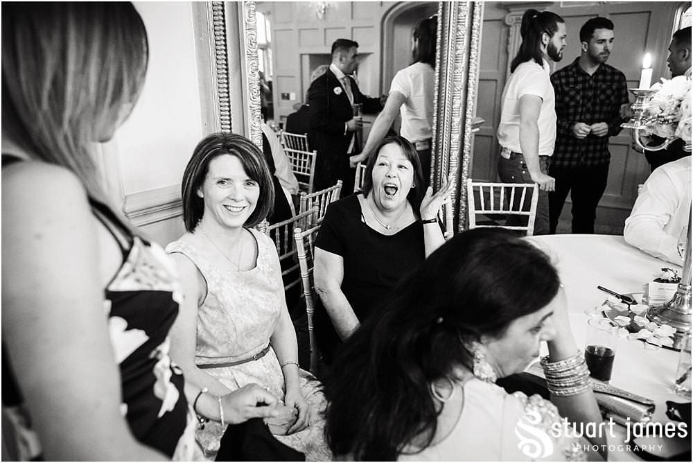 Candid photographs of the guests enjoying the evening reception at Weston