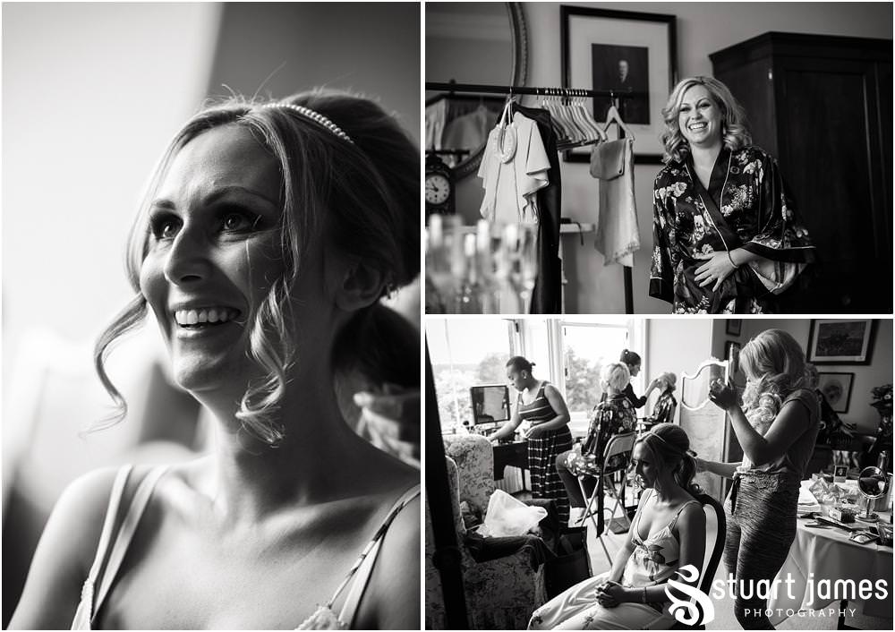 Documenting the morning preparations of the beautiful bride in the bedroom at Sandon Hall in Staffordshire by Documentary Wedding Photographer Stuart James