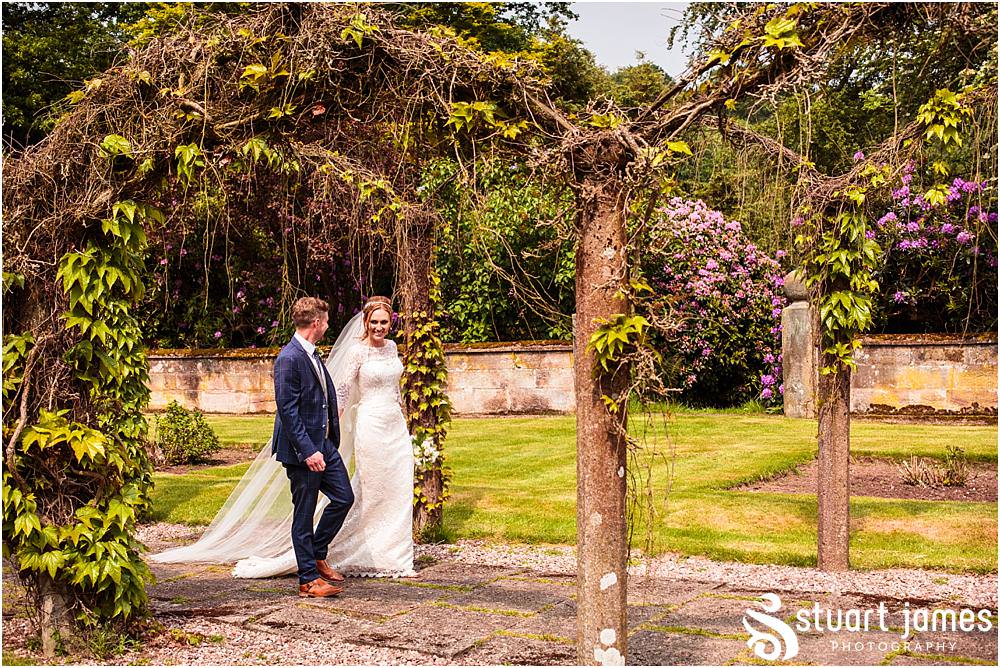 Creative portraits of the beautiful Bride and Groom around the stunning grounds of Sandon Hall in Stafford by Documentary Wedding Photographer Stuart James