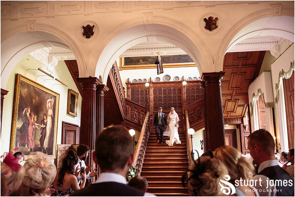 Capturing the entrance to the beautiful reception at Sandon Hall in Stafford by Documentary Wedding Photographer Stuart James