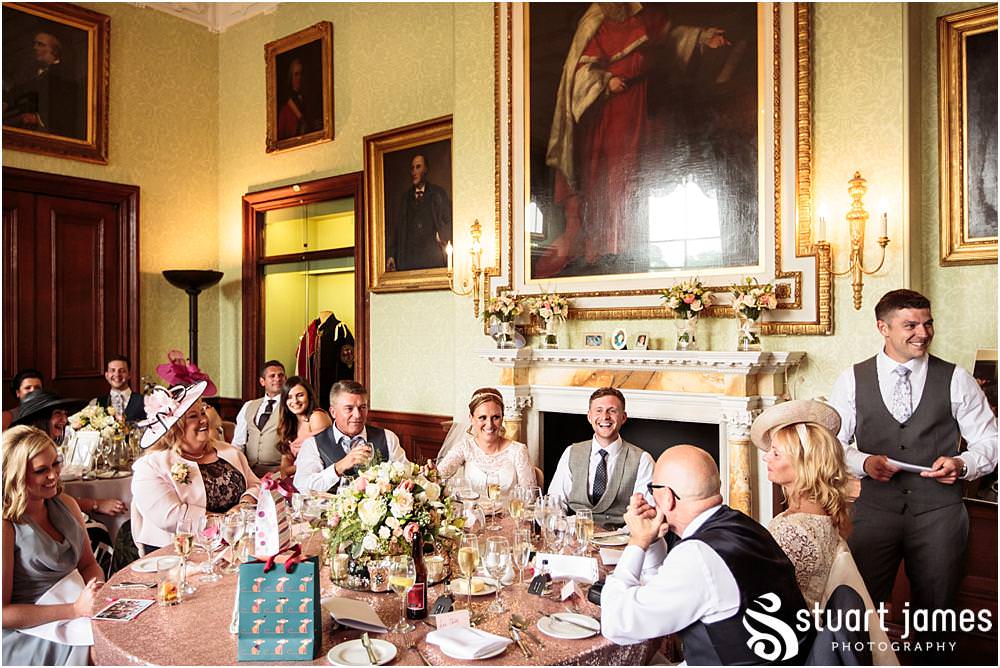 Capturing the speech of the best man and the fabulous guest reactions at Sandon Hall in Stafford by Documentary Wedding Photographer Stuart James