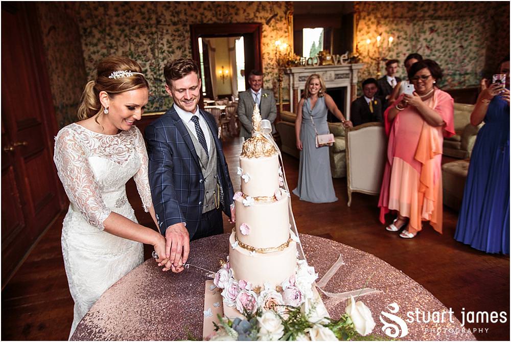 Stunning wedding cake from Miss Lolas Bakehouse at Sandon Hall in Stafford by Documentary Wedding Photographer Stuart James