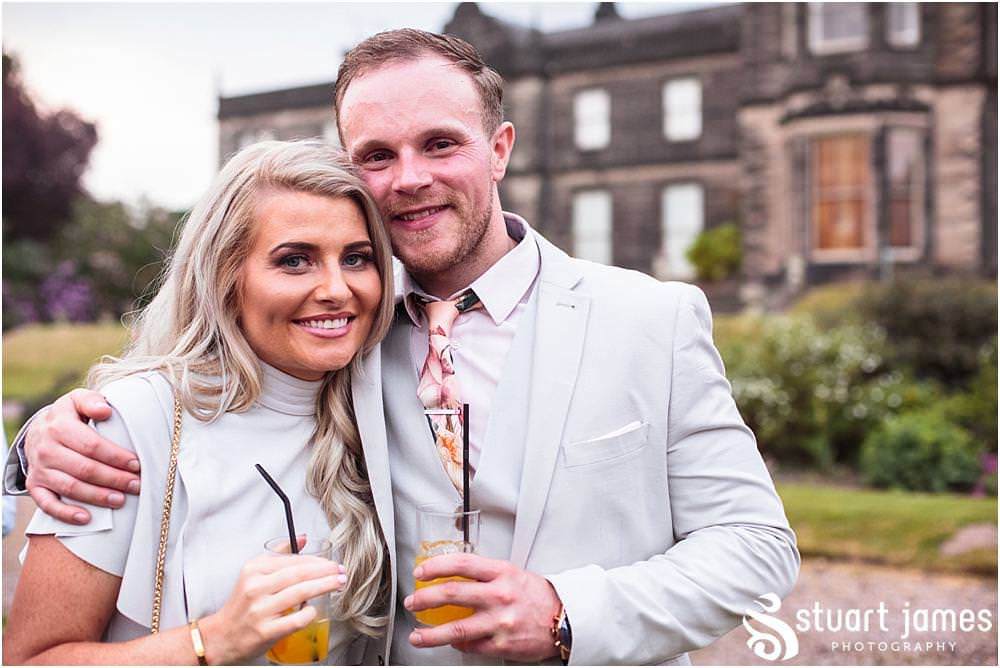 Capturing the fun of the reception with candid photographs of the guests at the Staffordshire Tipi Wedding reception