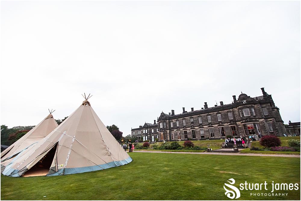 Capturing the fun of the reception with candid photographs of the guests at the Staffordshire Tipi Wedding reception