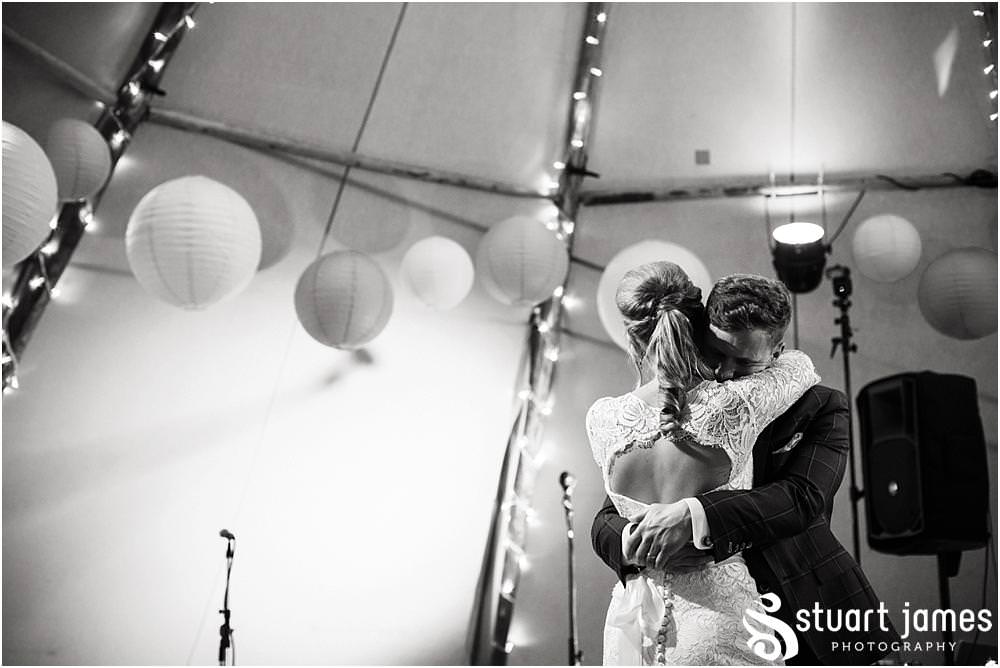 Creative photographs of the first dance to open the Staffordshire Tipi Wedding reception