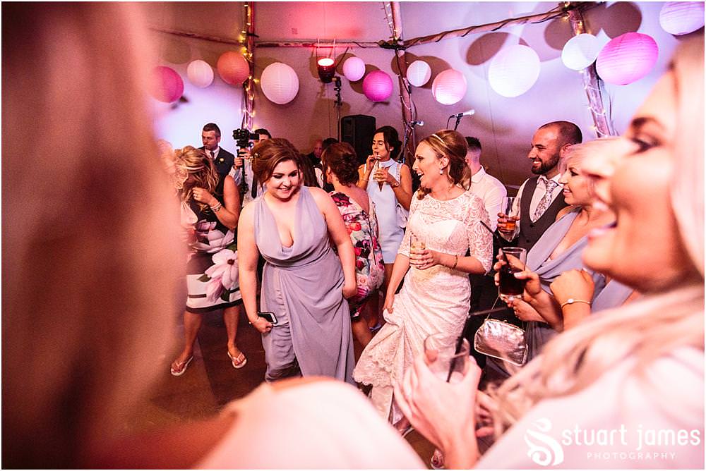 Photographs that capture the life of the party as the reception truly got rocking for the Staffordshire Tipi Wedding reception