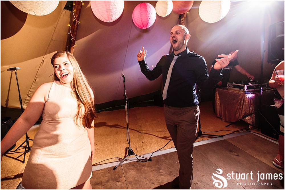 Photographs that capture the life of the party as the reception truly got rocking for the Staffordshire Tipi Wedding reception