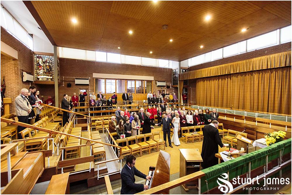 Unobtrusive natural photographs telling the story of the wedding ceremony at Wesley Methodist by West Bromwich West Bromwich Wedding Photographer Stuart James