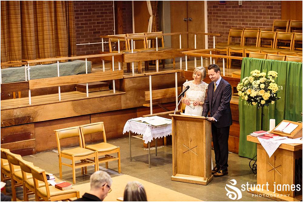 Unobtrusive natural photographs telling the story of the wedding ceremony at Wesley Methodist by West Bromwich West Bromwich Wedding Photographer Stuart James