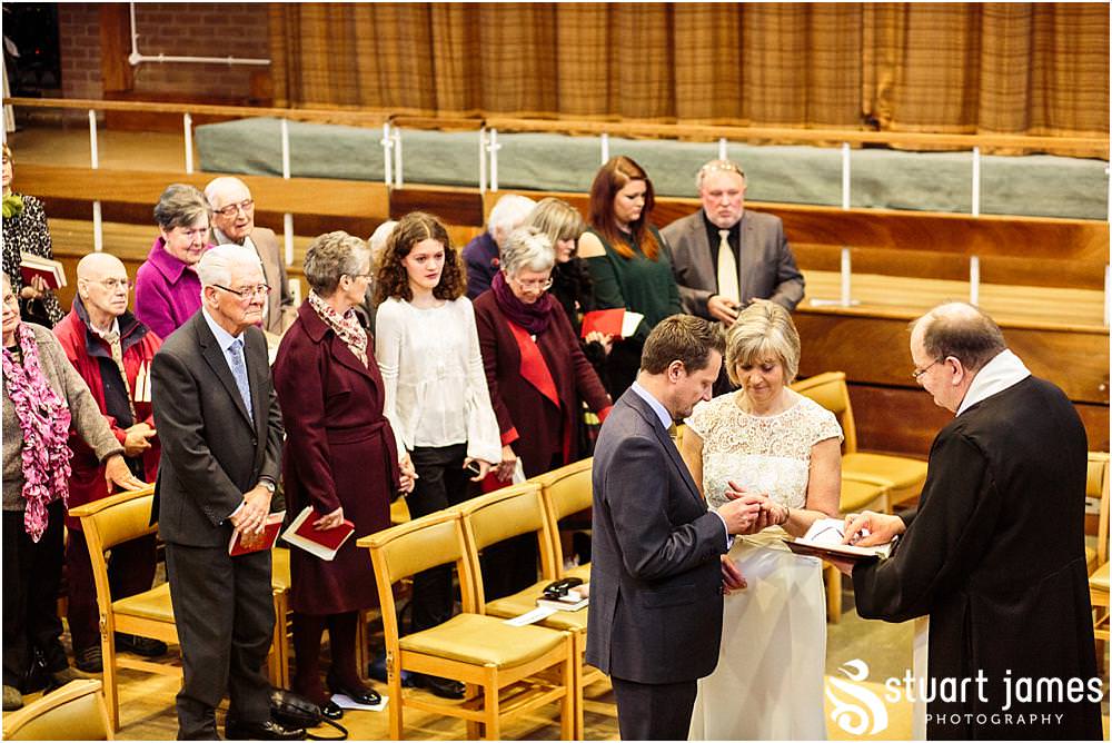 Unobtrusive natural photographs telling the story of the wedding ceremony at Wesley Methodist by West Bromwich West Bromwich Wedding Photographer Stuart James