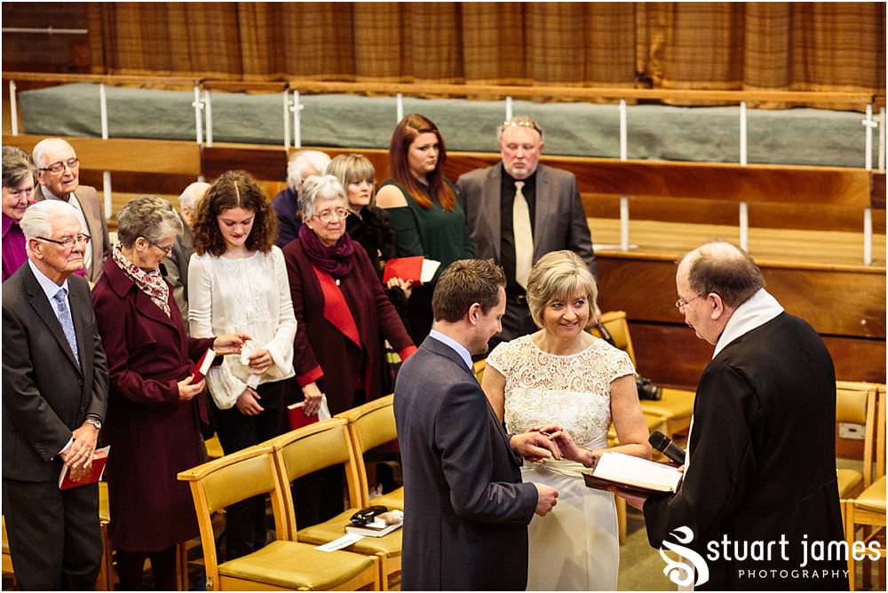 Unobtrusive natural photographs telling the story of the wedding ceremony at Wesley Methodist by West Bromwich West Bromwich Wedding Photographer Stuart James