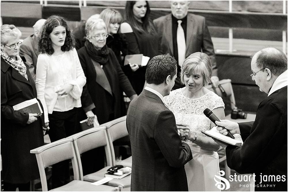 Unobtrusive natural photographs telling the story of the wedding ceremony at Wesley Methodist by West Bromwich West Bromwich Wedding Photographer Stuart James