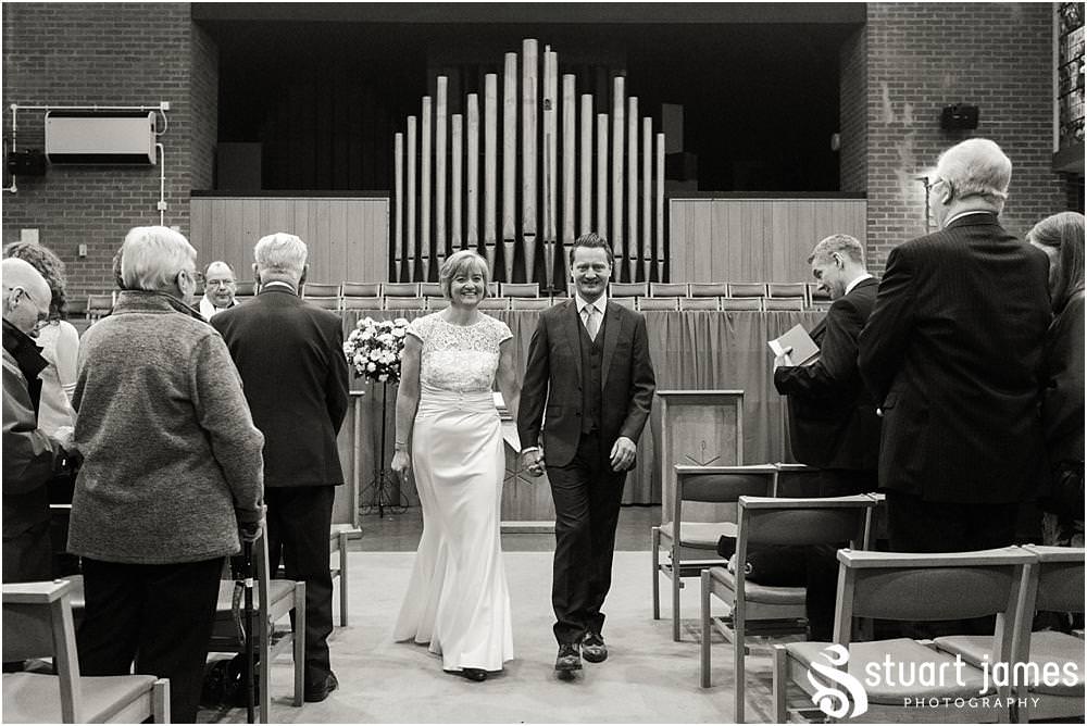 Unobtrusive natural photographs telling the story of the wedding ceremony at Wesley Methodist by West Bromwich West Bromwich Wedding Photographer Stuart James