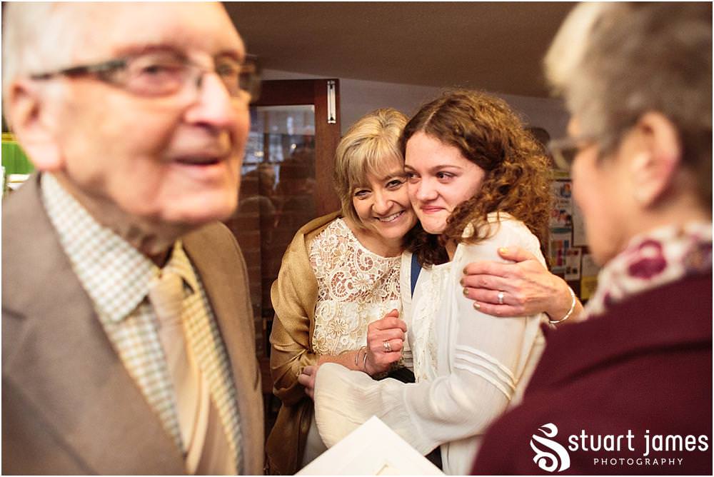 Candid photographs of the tea and coffee reception at Wesley Methodist by West Bromwich West Bromwich Wedding Photographer Stuart James