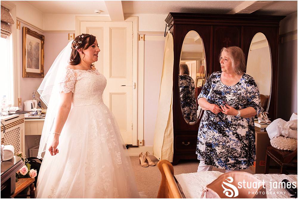 Beautiful moment as the Mother of the Bride arrives at Netherstowe House in Lichfield by Lichfield Wedding Photographer Stuart James
